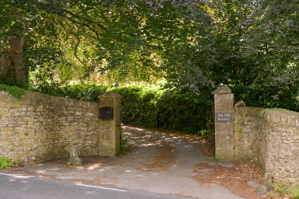 Gated tree-lined drive