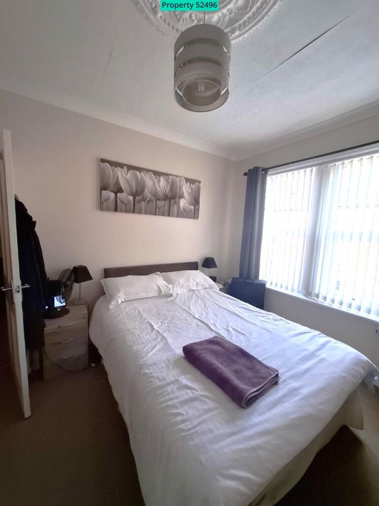 Bedroom  Three  13'11 x 11'10