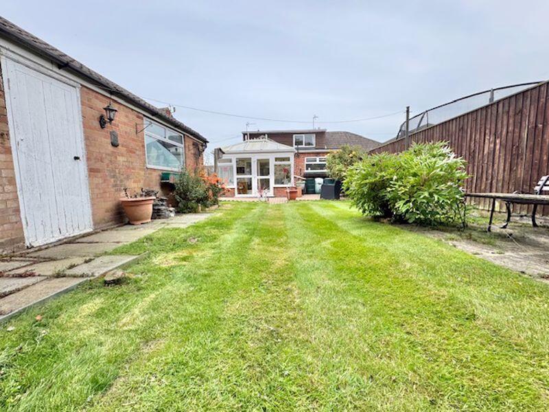 Rear garden and elevation
