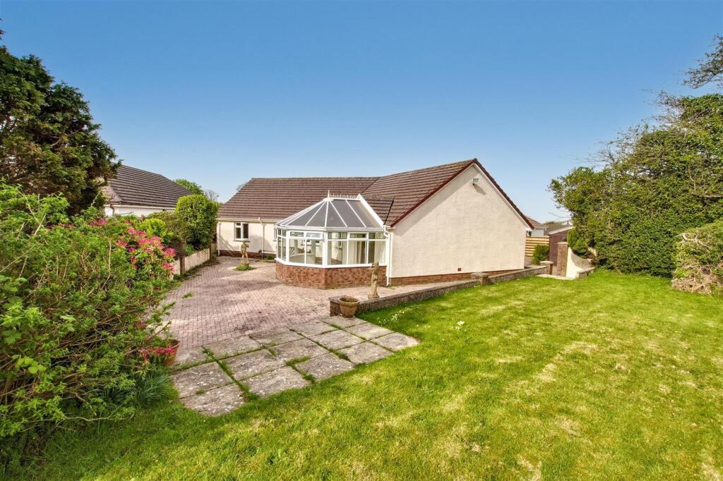 Rear lawn garden and property