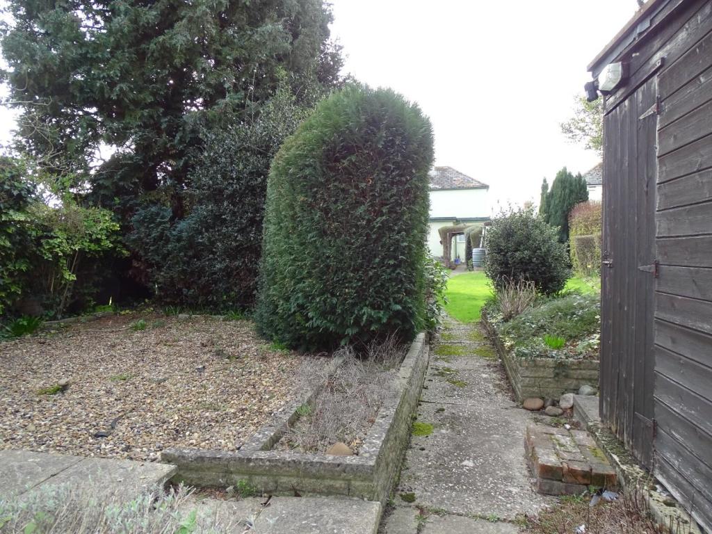 SECLUDED LOWER PATIO AREA AND SHED