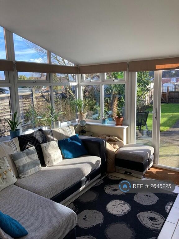 Separate Bright Lounge Opening Into Garden