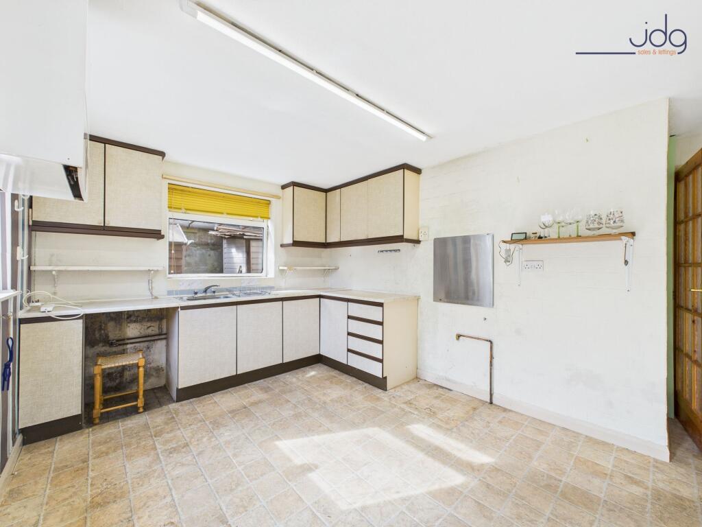 Kitchen with French Doors leading out to the Garden