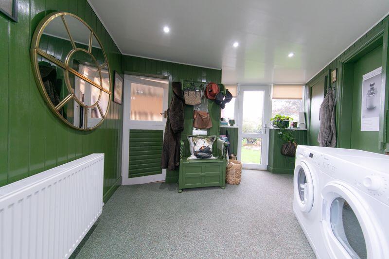 Side porch and utilities space