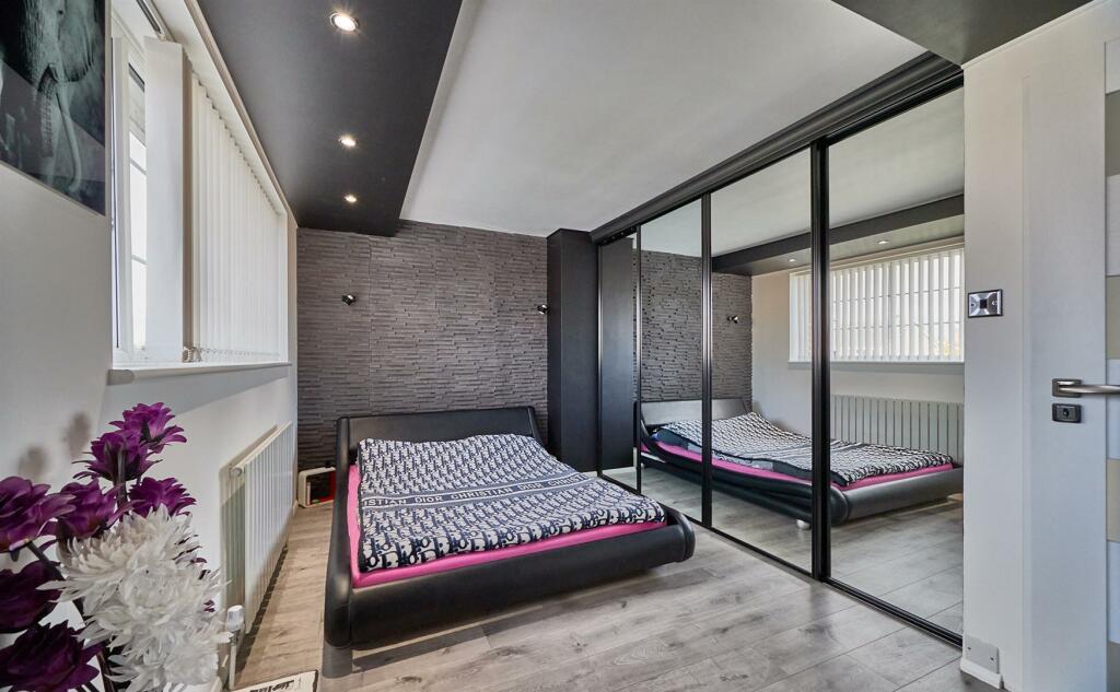 FRONT BEDROOM ONE