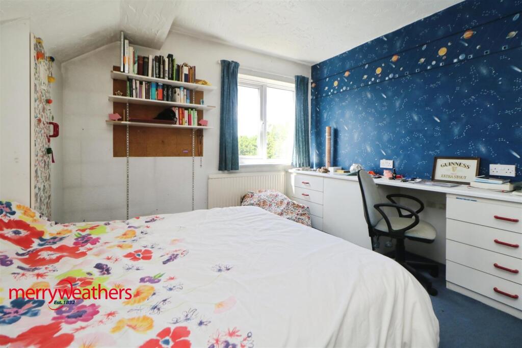 FRONT BEDROOM ONE