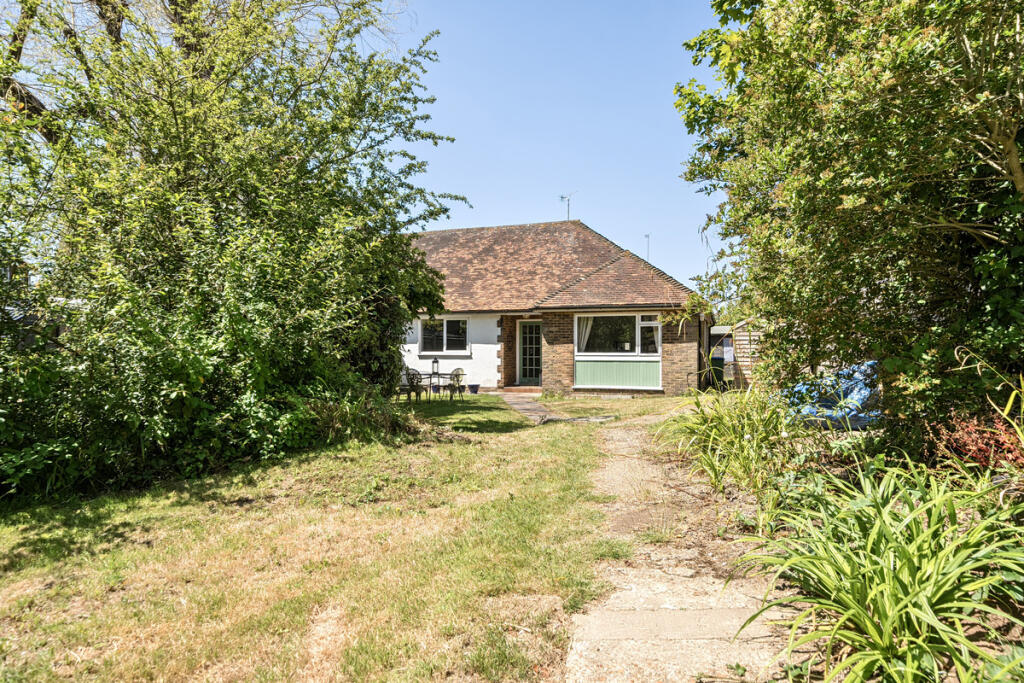 Front elevation and East facing large front garden