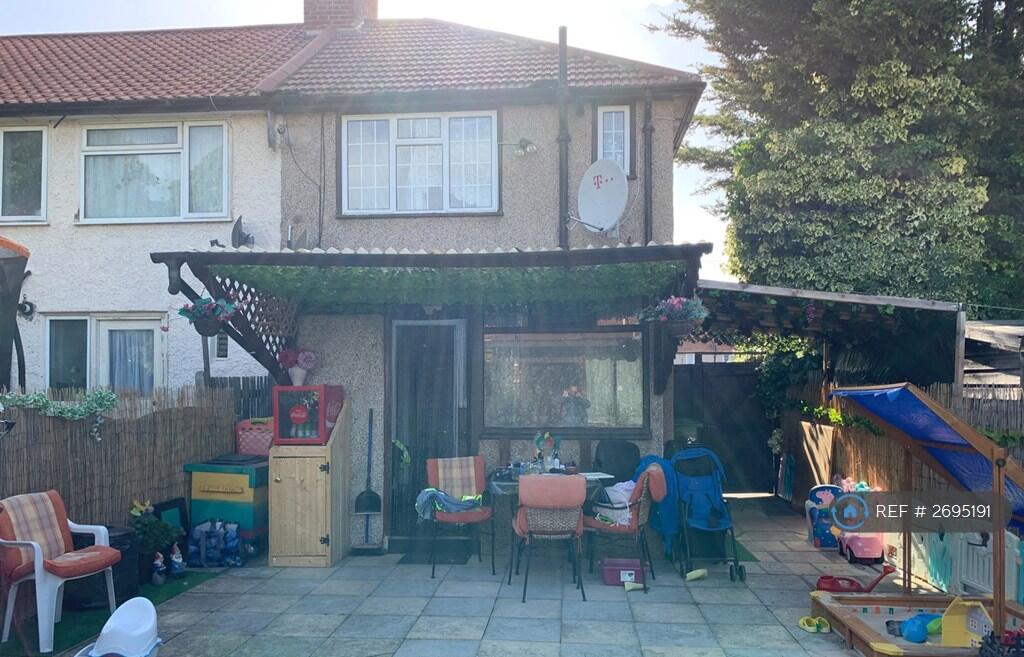 Sunroom And Garden Tiled Seating Area