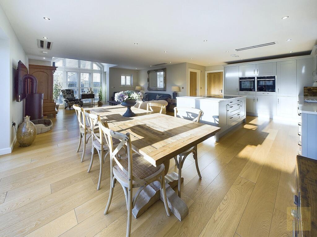 View from dining area into the open plan living and kitchen area