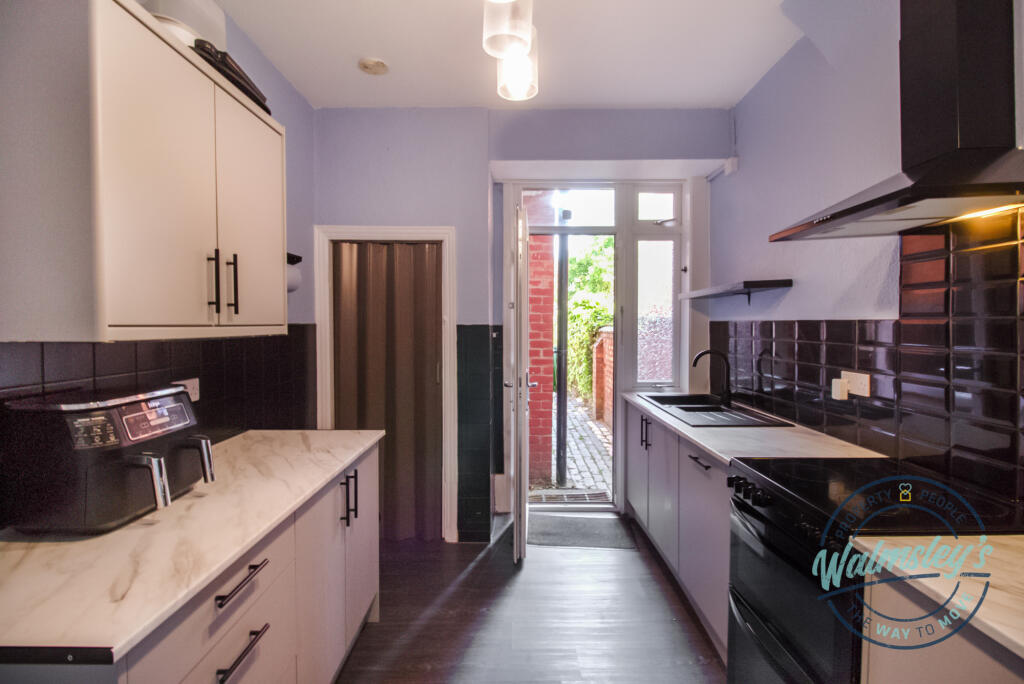 Kitchen with patio door garden