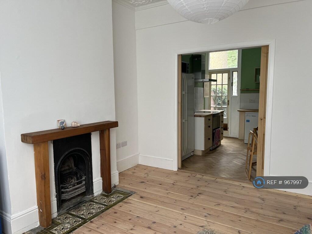 Fireplace Through To Kitchen With Pocket Doors