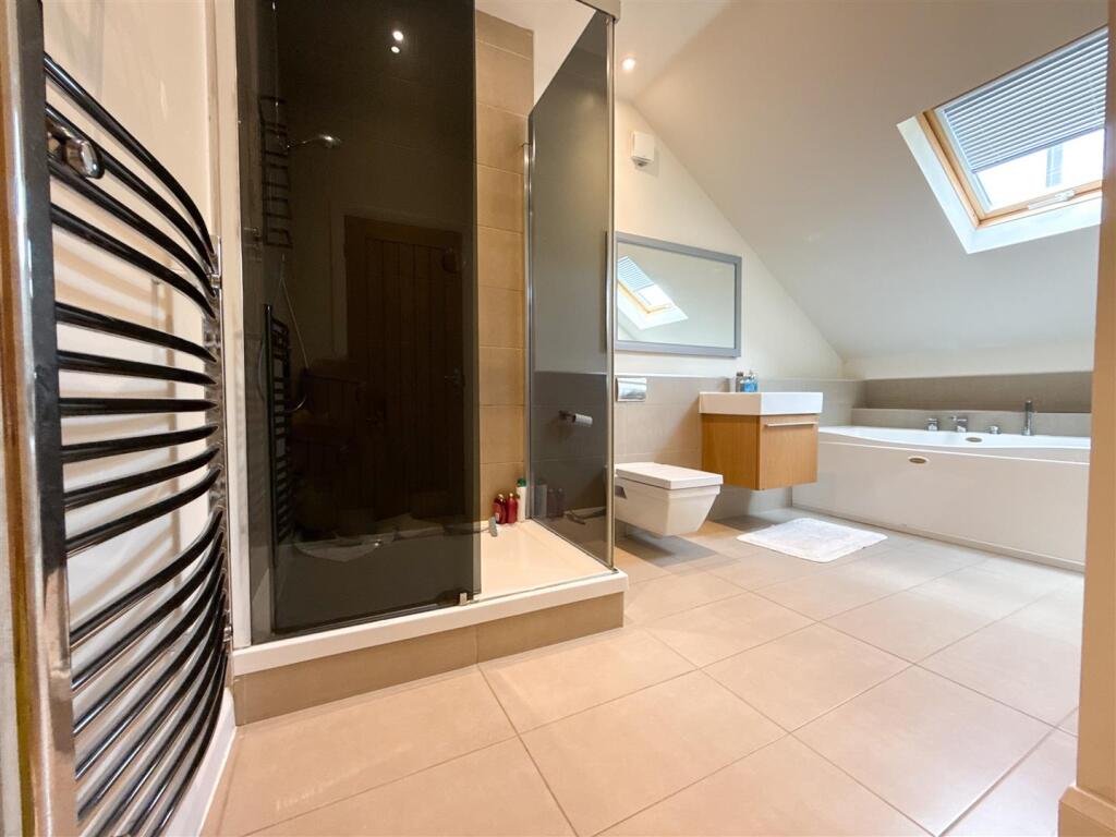 FAMILY BATH AND SHOWER ROOM