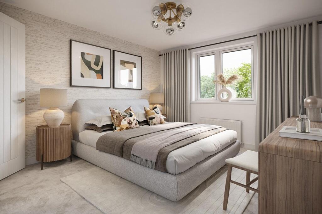 Bedroom 1 boasts an en suite shower room