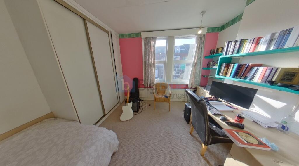 Bright and inviting double bedroom featuring a ...