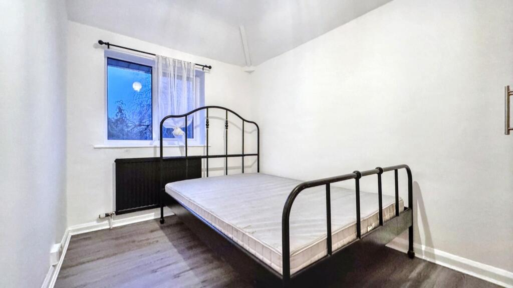 A spacious and bright double bedroom, perfect f...