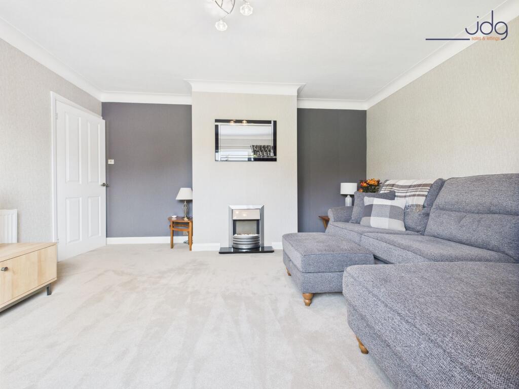 Spacious Lounge with Electric Fire