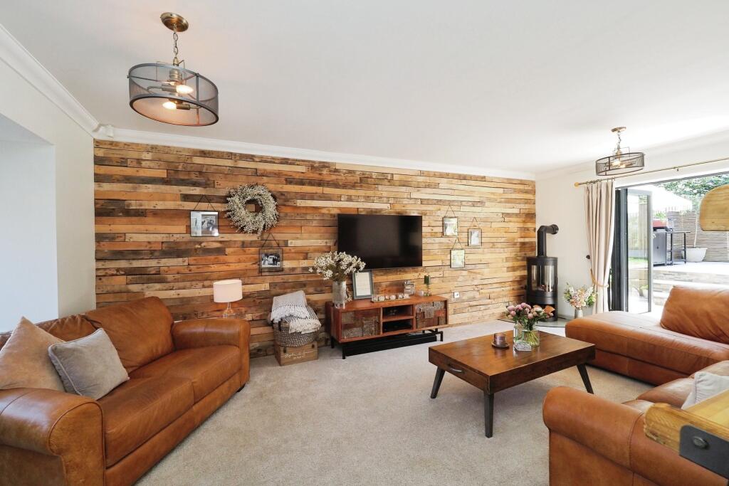 Stunning Lounge with Bay, Bi folds and Feature Wall