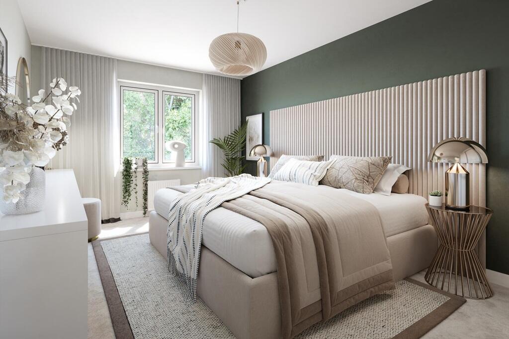 King size bedroom with en suite shower room and built in storage space