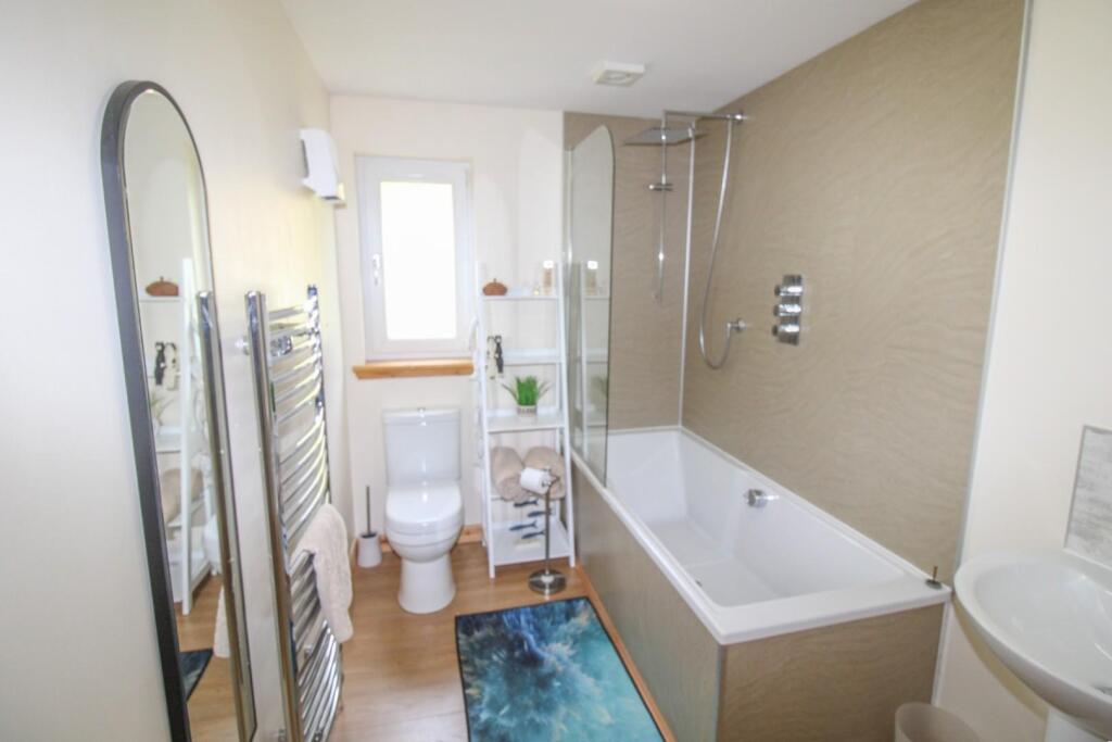 BEDROOM ONE EN-SUITE BATHROOM.jpg