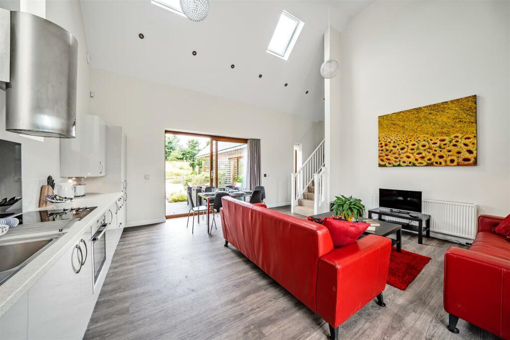 Open plan sitting/kitchen/dining area