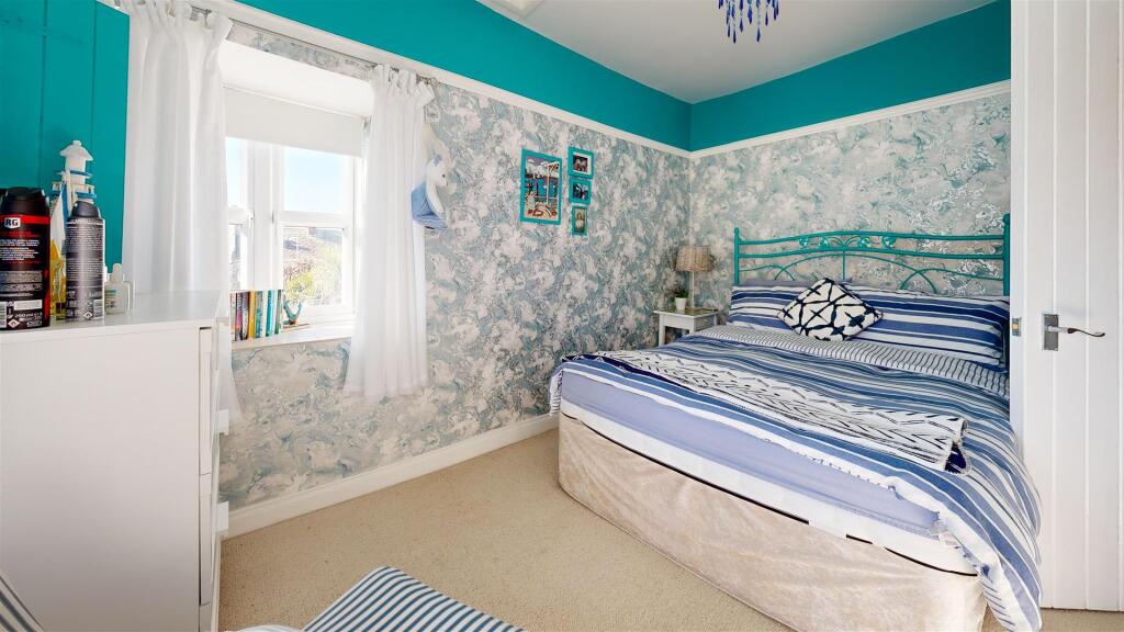 3-Cove-Cottages-Bedroom.jpg