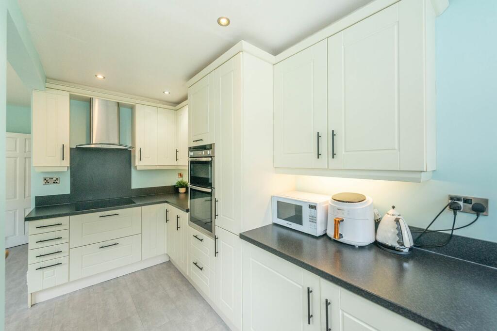 SITTING ROOM DINING ROOM AND DINING KITCHEN