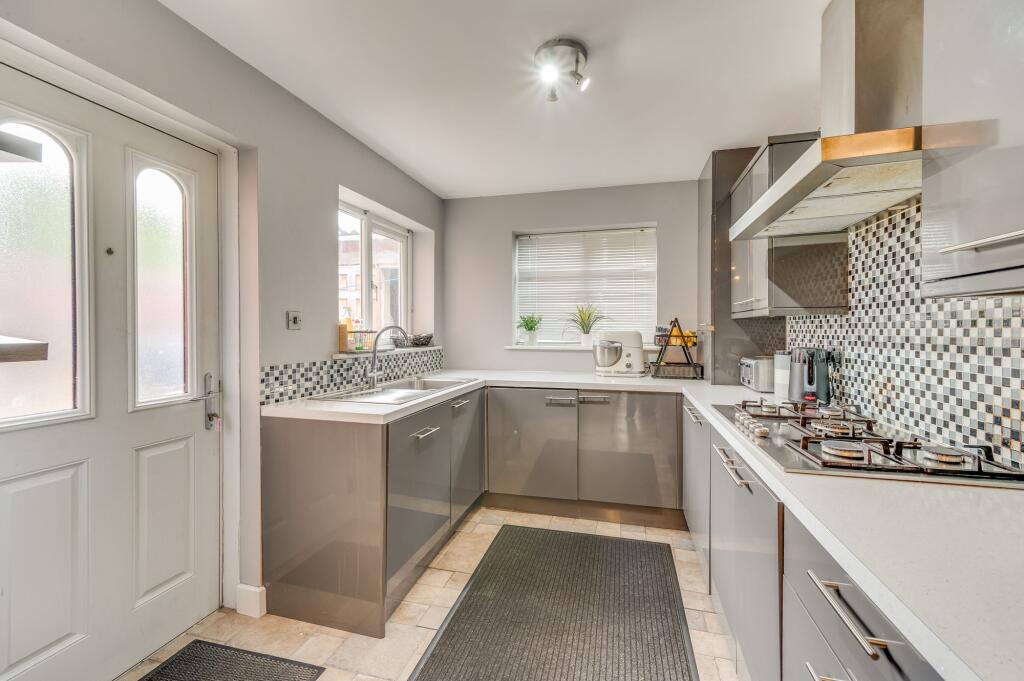 LIVING ROOM, KITCHEN AND DINING ROOMS