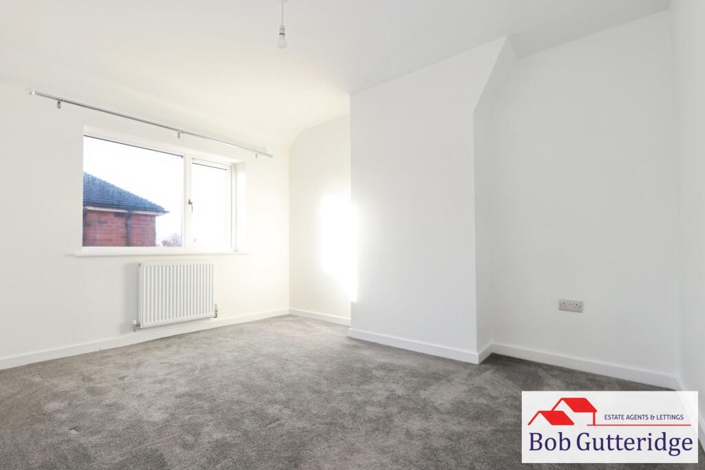 BEDROOM ONE (REAR)