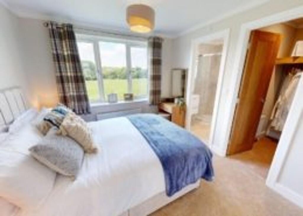 Primary Bedroom  &amp; Walk-in Wardrobe