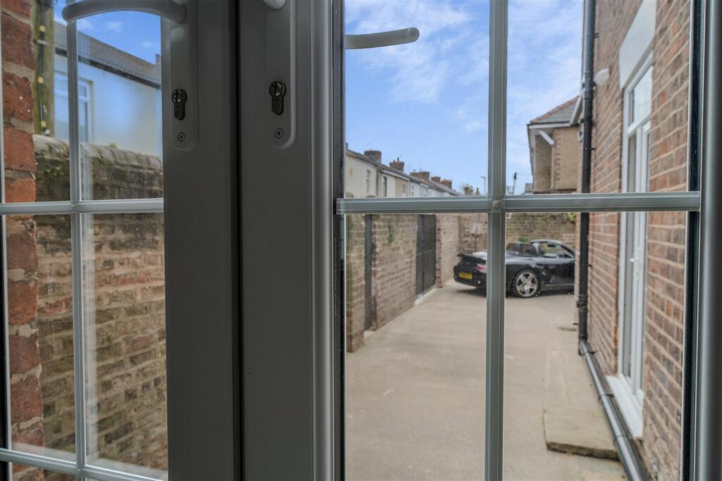 French doors to courtyard