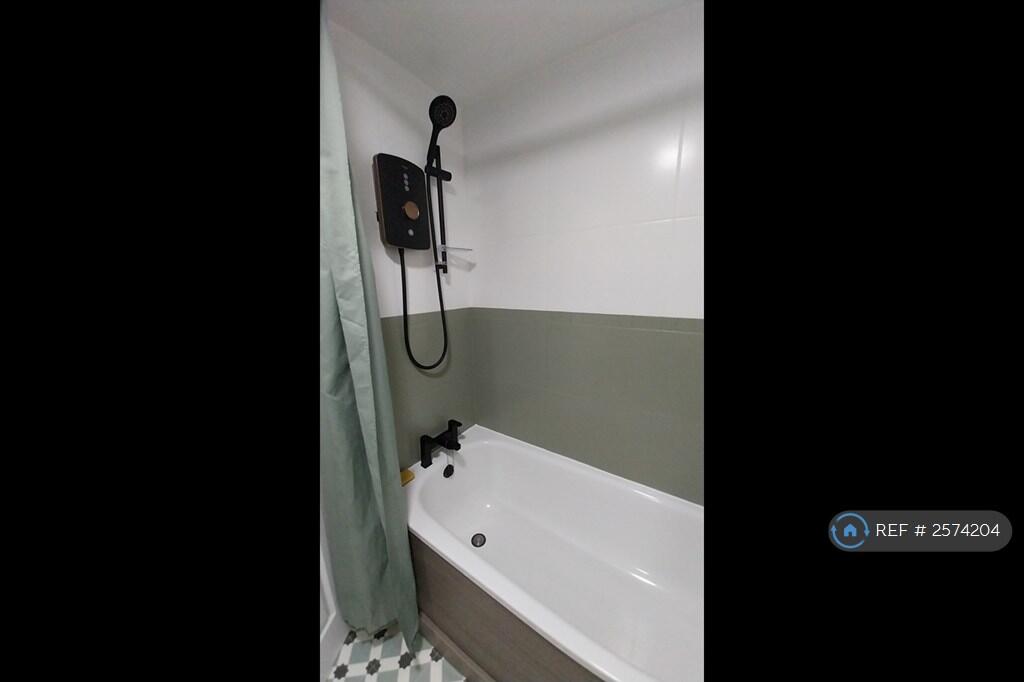 Bath With Mixer Tap And Electric Shower