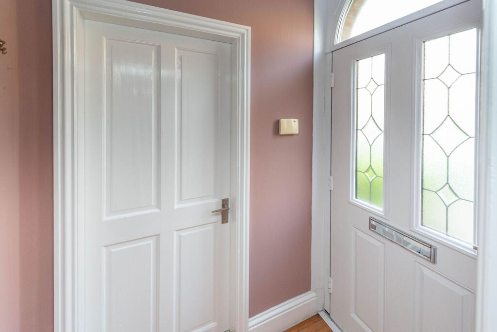 ENTRANCE HALL AND LANDING