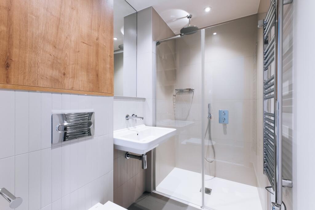 Experience the elegance of this modern bathroom, designed for both functionality and style.