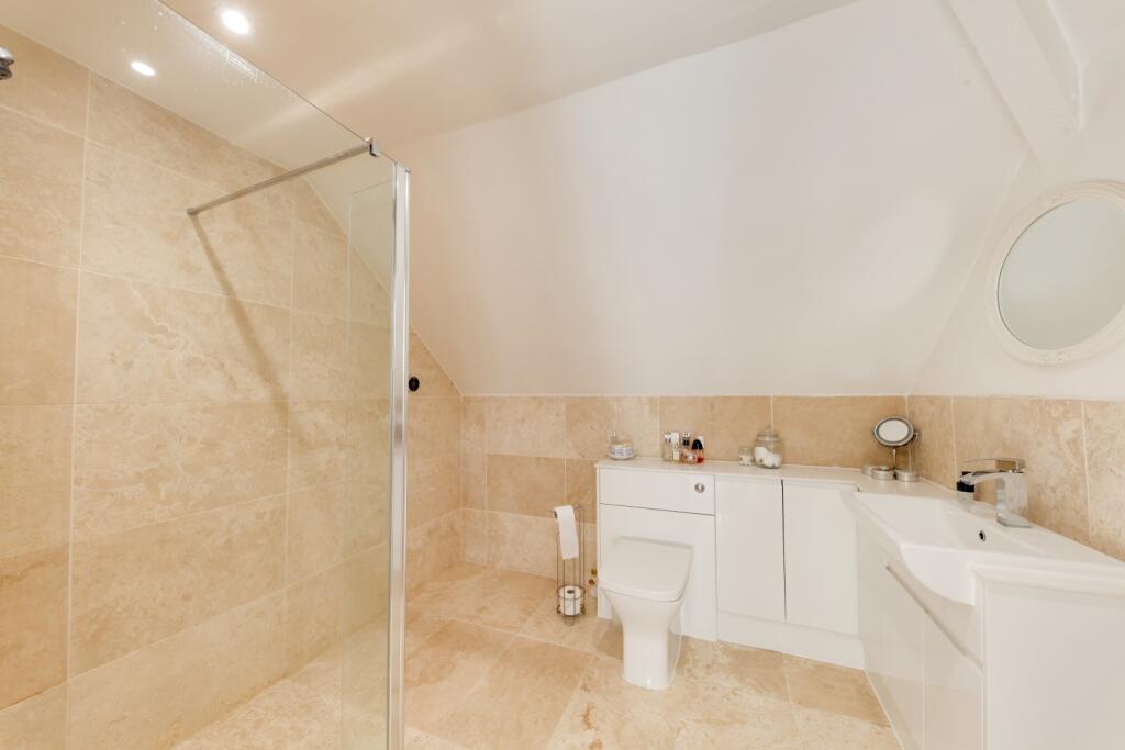 large ensuite with partial wet room plumbing
