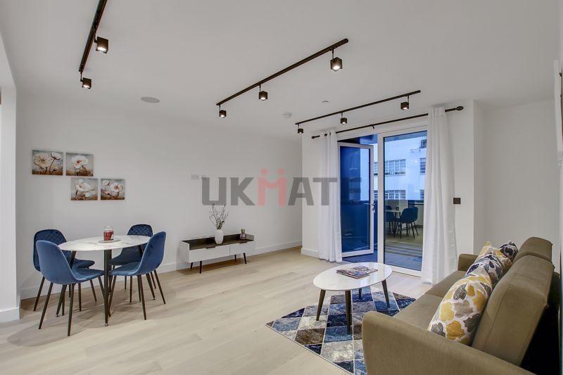 Bright and contemporary living room featuring a...