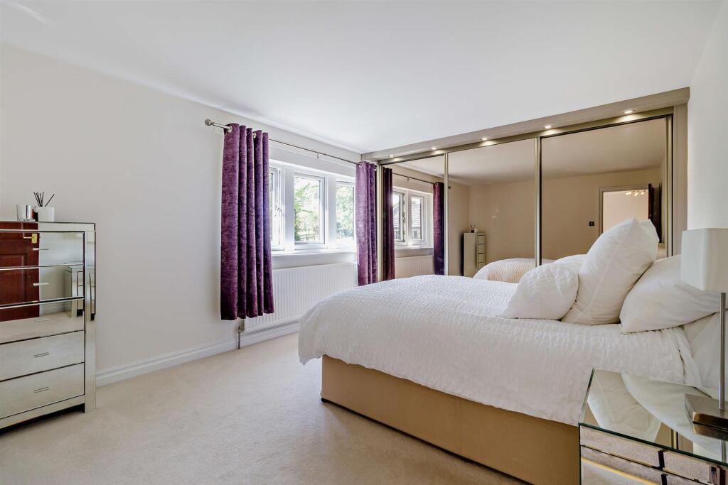 FRONT BEDROOM ONE