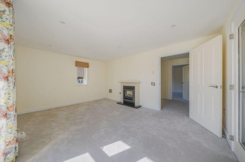 Living/dining room through to hall