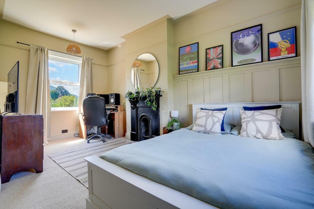 Bedroom 2 with feature fire place &amp; view