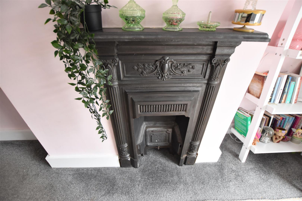CAST IRON FIRE SURROUND