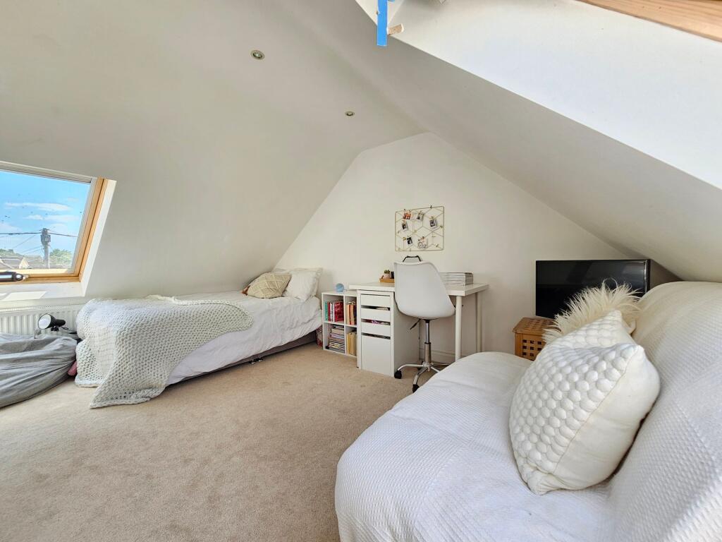 Generous Loft Room