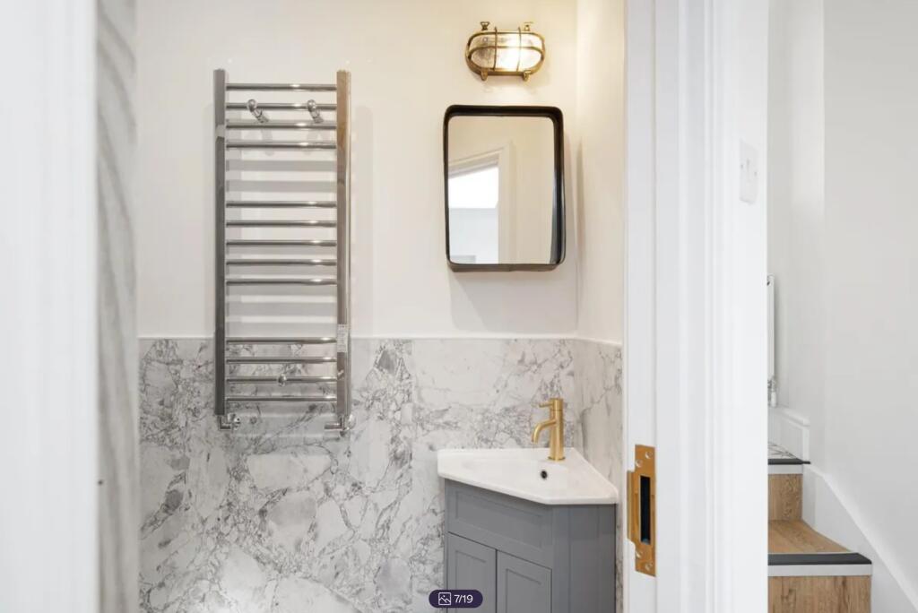 A beautifully designed bathroom featuring elega...
