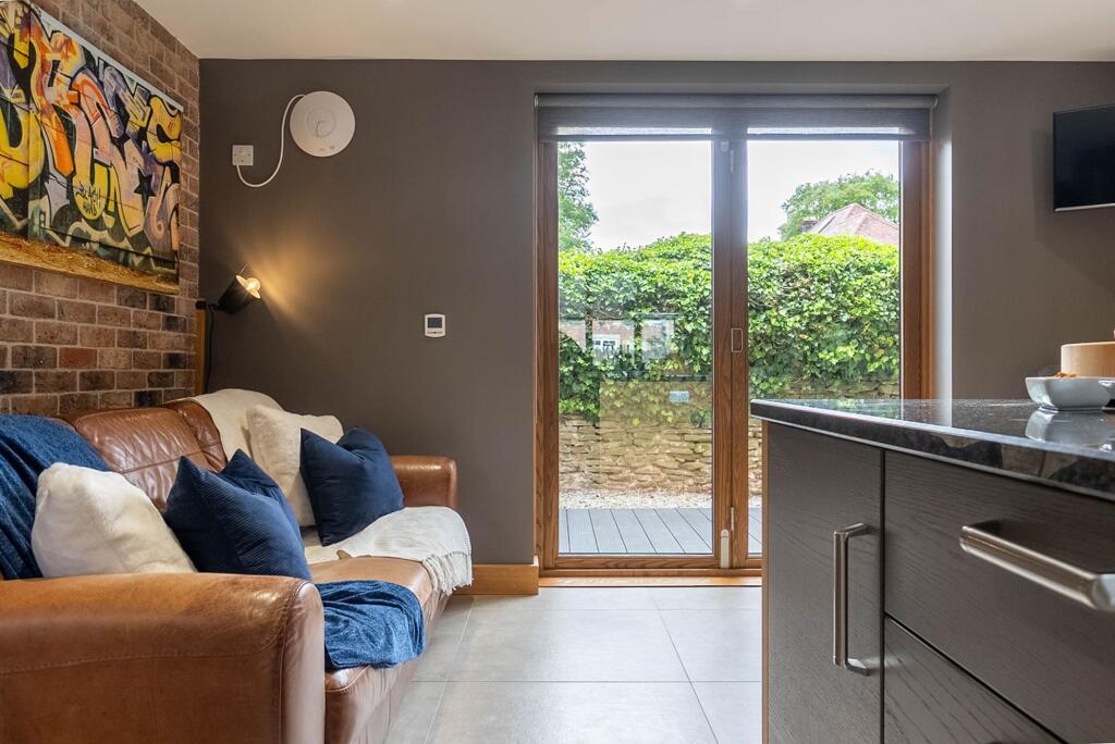 Relax and socialise in the kitchen snug