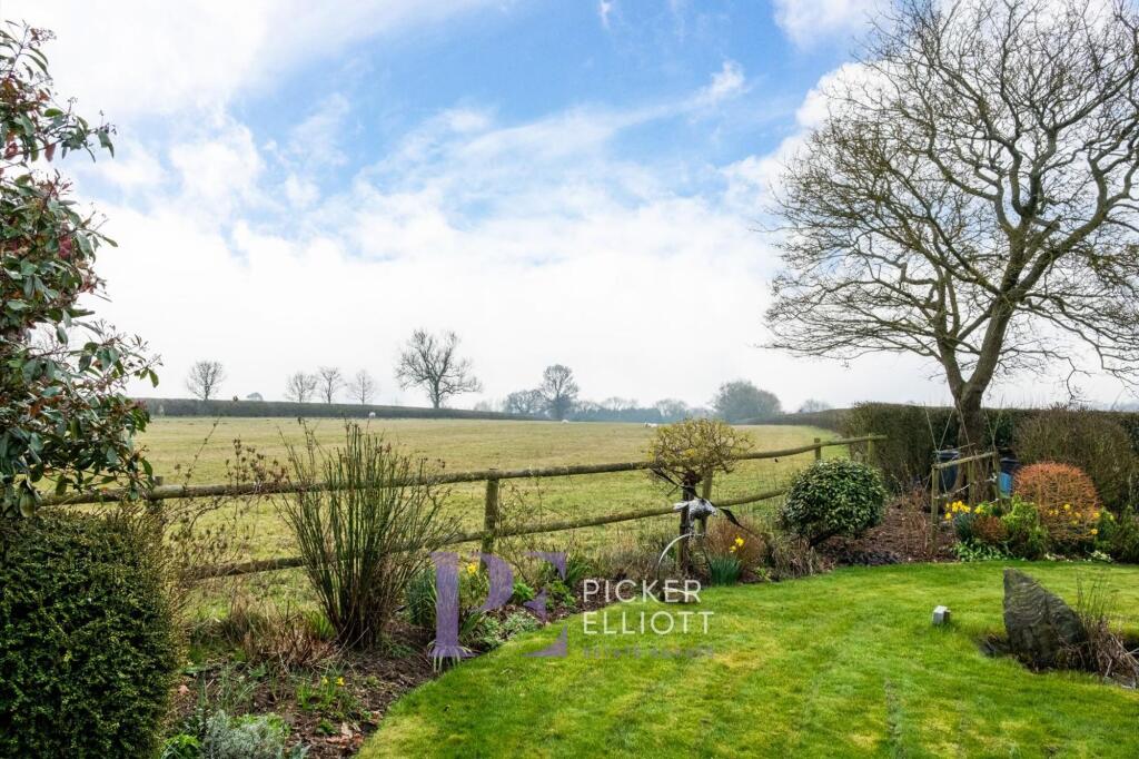 To the rear of the Property