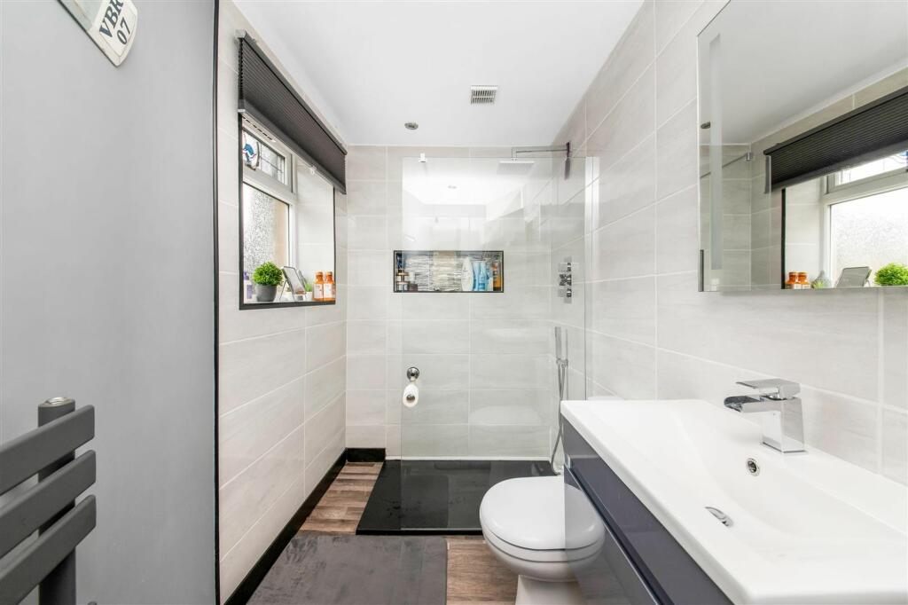 BEDROOM ONE EN-SUITE SHOWER ROOM