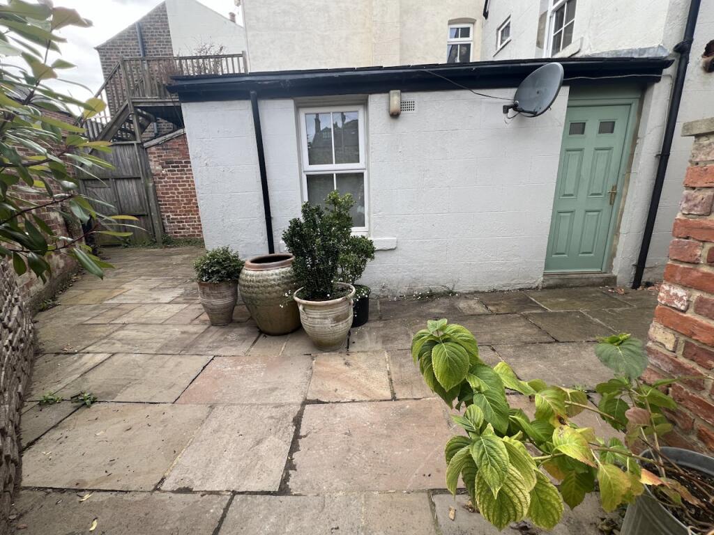 Rear Paved Garden Area