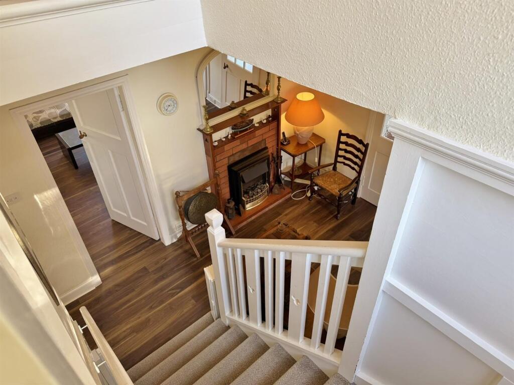 Main stairs down to entrance hallway
