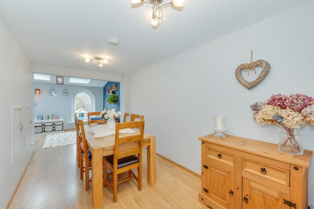 OPEN PLAN DINING ROOM AND SITTING ROOM