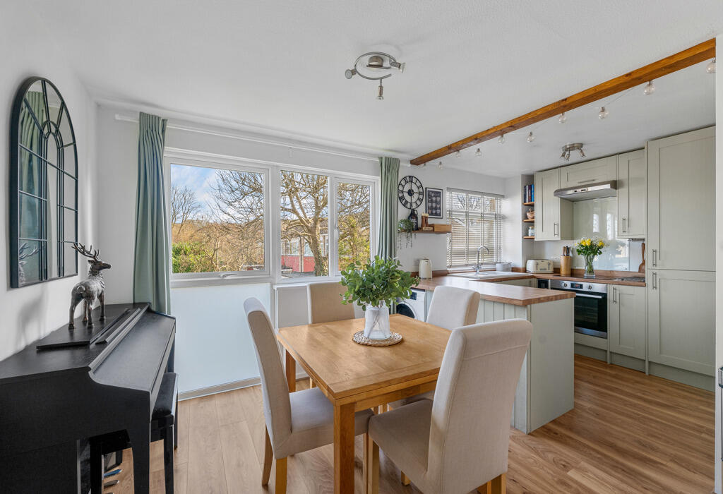 Dine with views overlooking green communal space