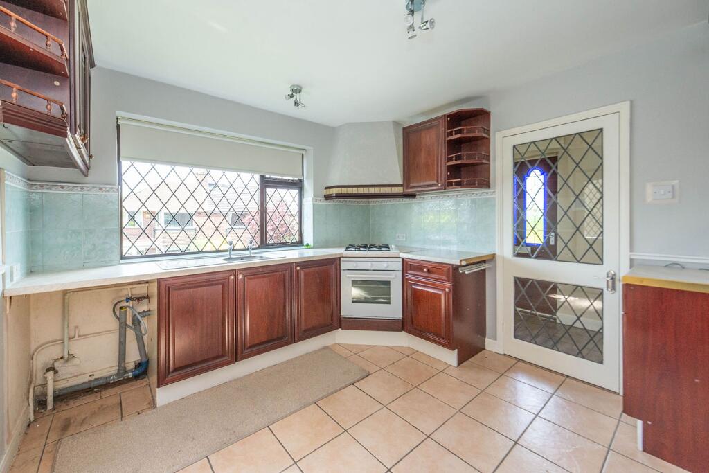 SITTING ROOM DINING KITCHEN AND SUN ROOM