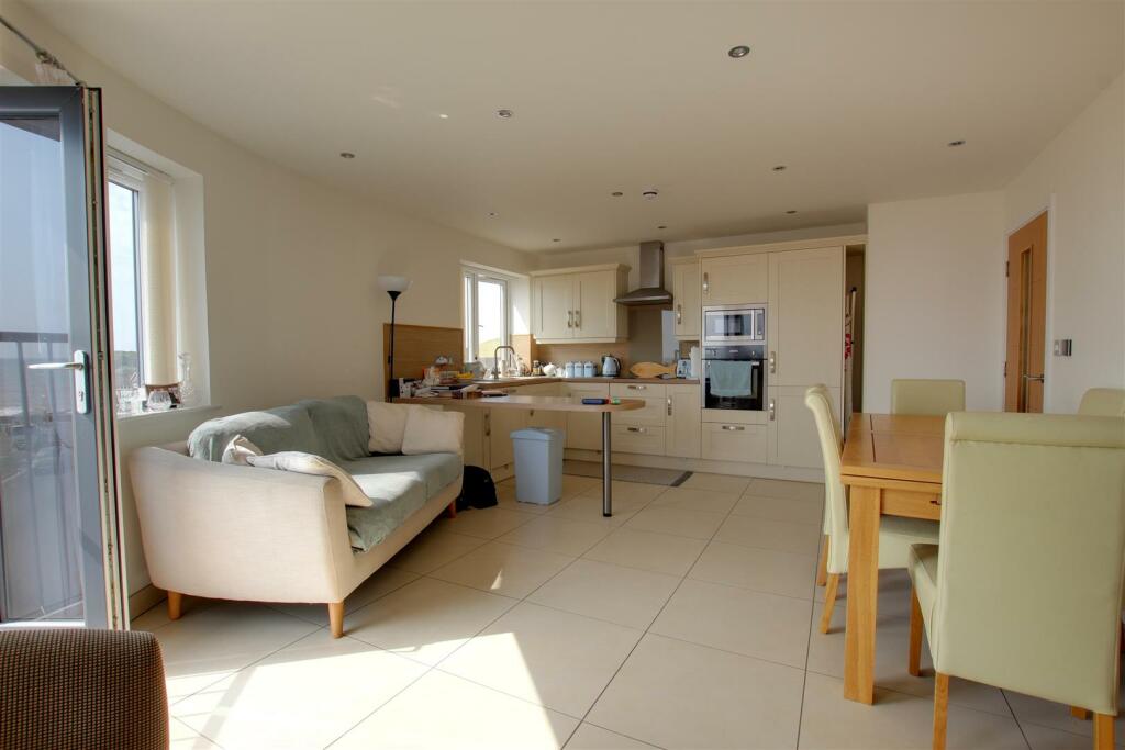 LIVING ROOM WITH KITCHEN AREA